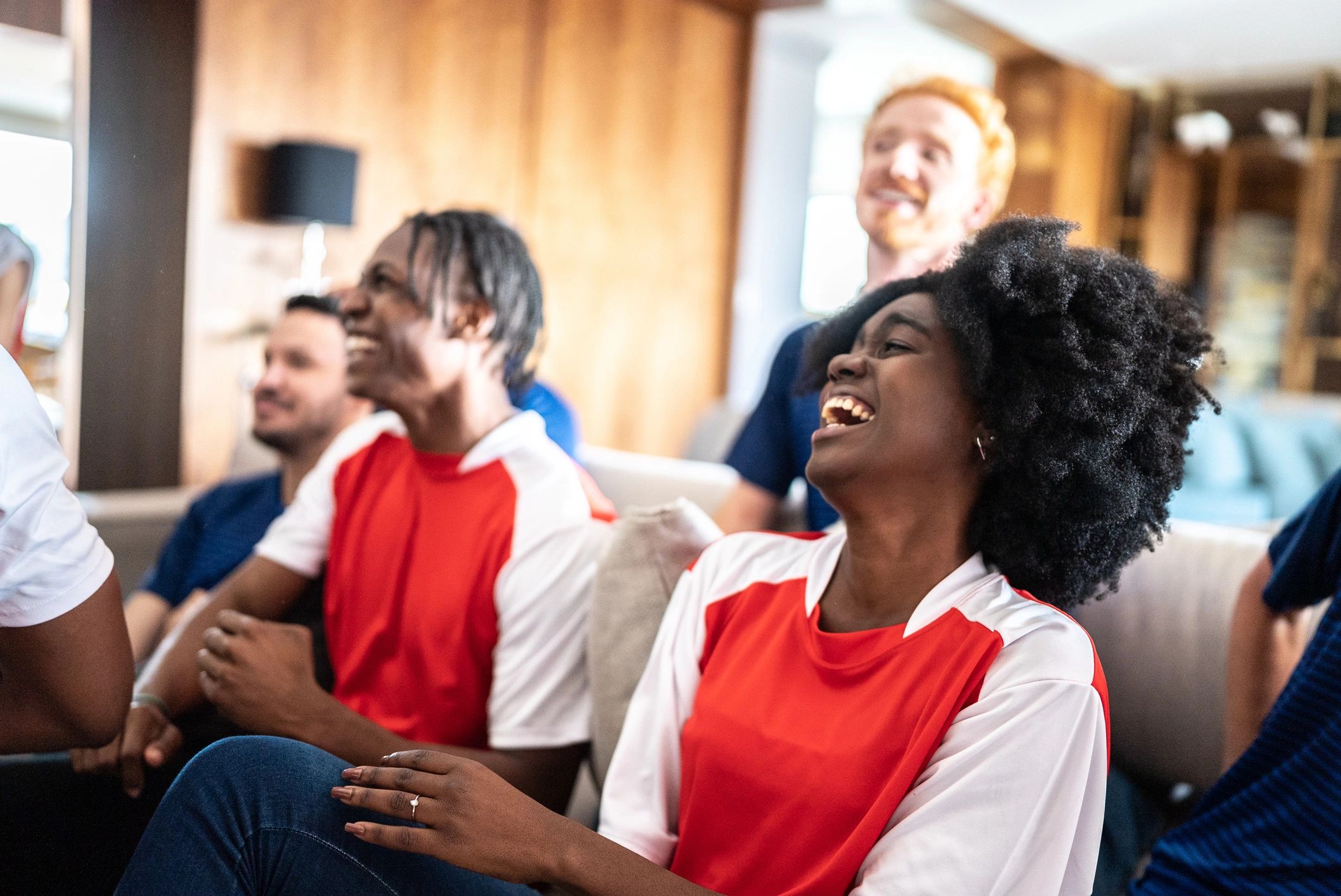 Sports fans watching a match together